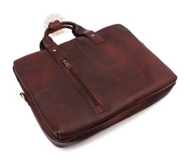 Vogue Crafts and Designs Pvt. Ltd. manufactures Brown Leather Zip bag at wholesale price.